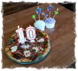 SPIN! Neapolitan Pizza 10th anniversary candles on pizza and gelato