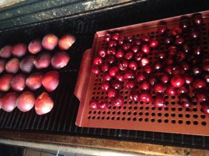 peaches and cherries on grill